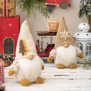 Festive Christmas gnomes with knit hats and faux fur beards among holiday decor
