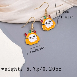 Detail shot showing 3.6cm by 1.8cm pumpkin skull earrings with size and weight info