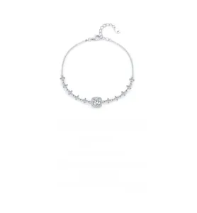 Macro shot of S925 sterling silver bracelet with square moissanite and clover charms