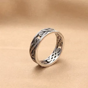 Vintage punk style hollow stainless steel ring with intricate Celtic knot patterns