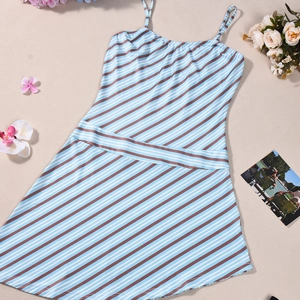 Detail of blue and white diagonal striped summer dress with thin straps and round neckline