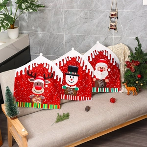 Christmas chair covers featuring Santa, Snowman and Reindeer patterns for holiday home decor