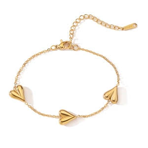 Detail of 18K gold plated stainless steel heart charm necklace with S.STEEL hallmark