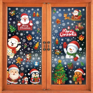 Christmas window stickers set featuring Santa, snowman and reindeer on a glass door