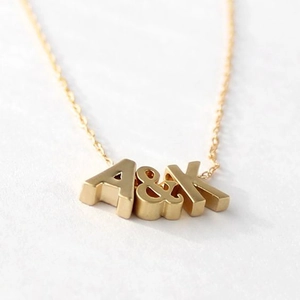 Collana minimalista in acciaio inossidabile dorato con pendente a cuore A&K da donna