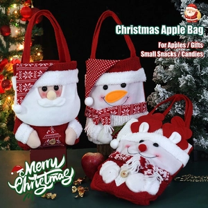 Christmas gift bags with 3D Santa, Snowman, and Reindeer designs for candy and apples