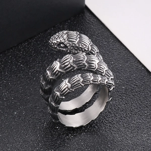 Retro punk stainless steel snake ring with detailed scales in a vintage silver finish