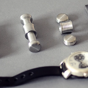 Magnetic Moondrop gravity desk toy in silver stainless steel with anti-slip texture