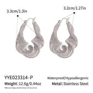 Detailed view of silver spiral irregular geometric earrings with precise measurements