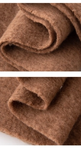 Close-up of brown wool fabric texture showing soft fiber detail and thickness