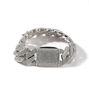 Detailed view of silver Cuban link chain featuring full cubic zirconia pavé stones