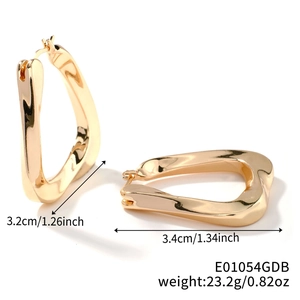 Detailed view of U-shaped gold earrings with dimensions 1.26 inch and weight 0.82 oz