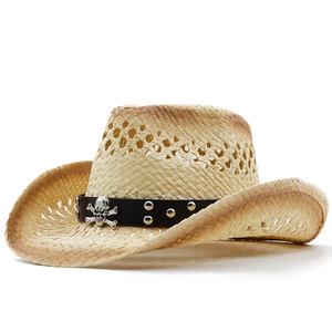Handmade raffia western cowboy hat with smoky gradient brim and skull emblem on a band