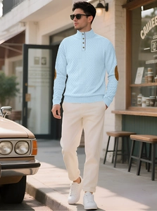 Men's light blue waffle knit sweater with stand collar and brown elbow patches