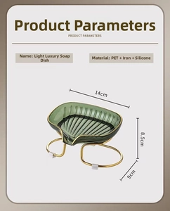 Detail view of shell-shaped soap dish with golden iron stand and dimensions of 14cm