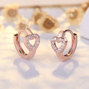 Elegant rose gold heart hoop earrings with sparkling pave zircon accents and a polished finish