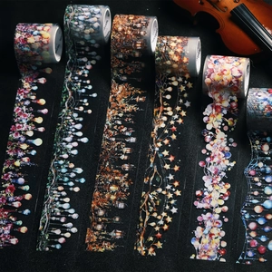 Artistic PET decorative tape featuring vintage lamps and floral patterns with violin props