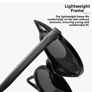 Detail of cute cat-ear shaped sunglasses with wide temples and high-gloss black finish