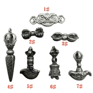 Assorted Tibetan Vajra and Bell metal pendants numbered 1 to 7 for DIY jewelry making