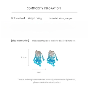 Size and material details for blue glass bead tassel earrings in a technical product sheet