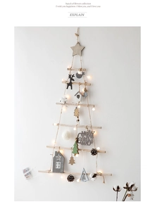 Hanging wooden Christmas tree wall decor with LED lights, stars, and natural pine cones