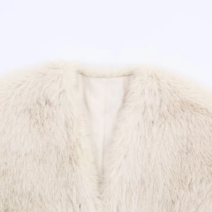 Women's apricot faux fur vest with soft shaggy texture and sleeveless short design