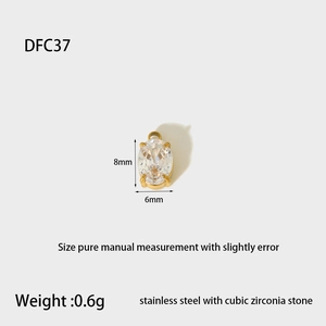 Detail view of gold-plated stainless steel oval pendant with cubic zirconia measurements