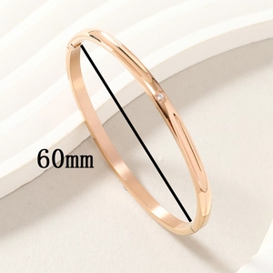 Rose gold titanium steel bracelet with diamond inlay and O-shaped clasp, 60mm inner diameter
