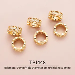 Macro shot of gold-plated brass spacer beads with cubic zirconia for DIY jewelry making