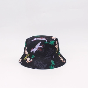 Kids reversible sun hat with colorful dinosaur and shark prints on black fabric