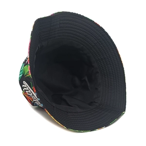 Detail of Hawaii embroidery and tropical floral print on a breathable cotton bucket hat