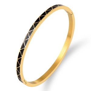 Polished 4mm gold-plated titanium steel bangle with geometric black enamel triangle inlay