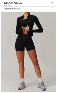 Ensemble de yoga noir premium comprenant veste zippée avec passe-pouces et short assorti