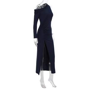 Detail of navy blue one-shoulder ruched dress with high side slit and slim fit silhouette