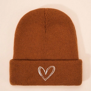 Caramel brown knitted beanie hat with white heart embroidery and ribbed cuff design