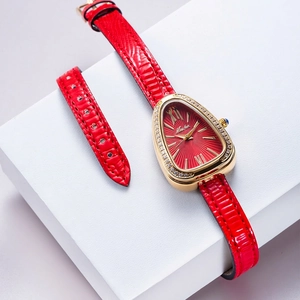 Elegant gold snake head watch with red sunray dial and red leather wrap strap for women