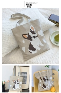 Detail of beige canvas tote bag featuring a black and white French Bulldog print with hearts