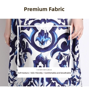 Detail of blue baroque floral print fabric with white buttons on stylish midi dress