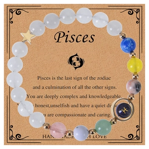 Pisces zodiac beaded bracelet with colorful stones on handmade gift display card