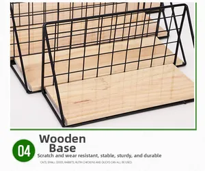 Detail of Nordic iron mesh wall shelf with natural wood base and black metal frame