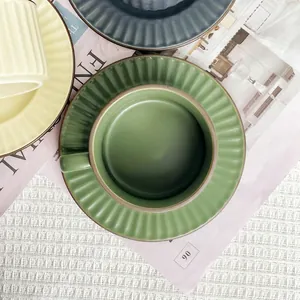 Nordic matte ceramic coffee cup and saucer set with vintage ribbed texture in dark green