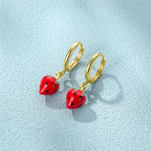 Close-up of gold-plated S925 sterling silver hoop earrings with red strawberry charms