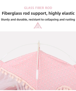 Detail of durable glass fiber rods and pink floral fabric with pom-pom trim on pet tent