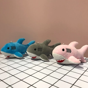 Plush shark keychains in blue, gray and pink colors with soft material and lanyards