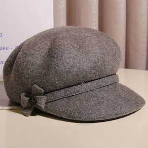 Grey wool octagonal newsboy cap with floral accent and crystal for autumn and winter