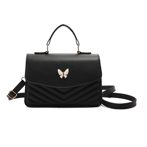Minimalist black quilted crossbody bag with white butterfly decoration for women
