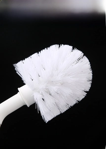 Close-up of durable white spherical brush head with screw thread for water barrel cleaning