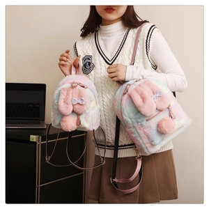 Detail shot of fluffy rainbow rabbit backpacks showing small and large size comparisons