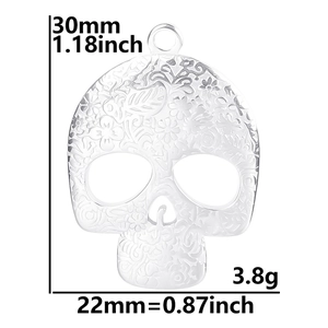 Detailed size specifications for the silver stainless steel skull pendant with floral engravings