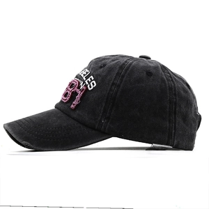 Detailed macro view of 3D embroidery and washed vintage fabric on 1981 baseball cap